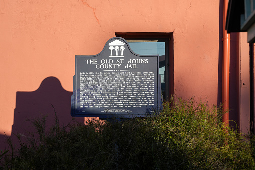 St. Augustine, Florida - December 28, 2022: Historical marker for the Old St Johns County Jail, explaining its horrific history