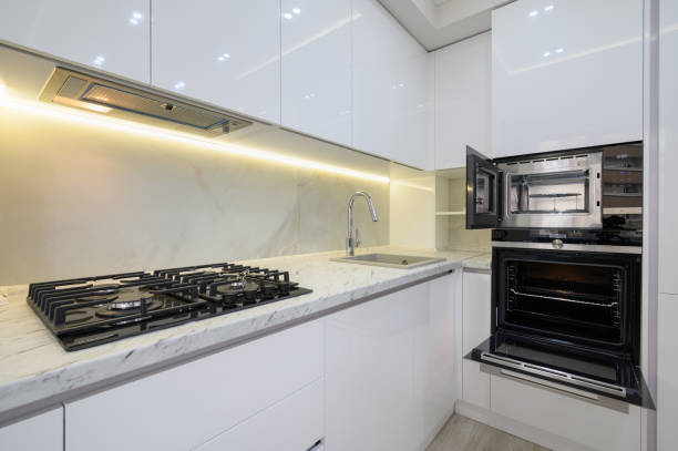 istock White modern kitchen with a stove, oven and microwave 1479474774