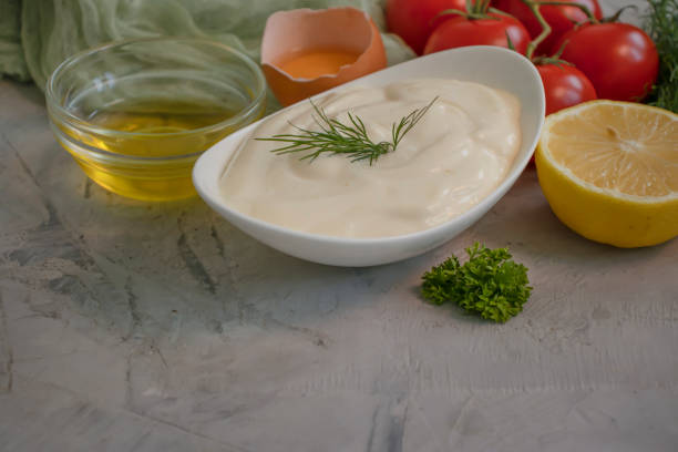 istock Homemade mayonnaise on old background 1479478673