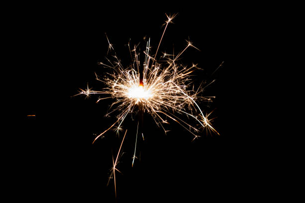 istock Burning sparkler isolated on black background. Fireworks theme. Light effect and texture. 1479478785