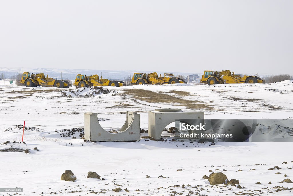 Equipamento de Construção pesada estacionados em uma linha - Royalty-free Gelo Foto de stock