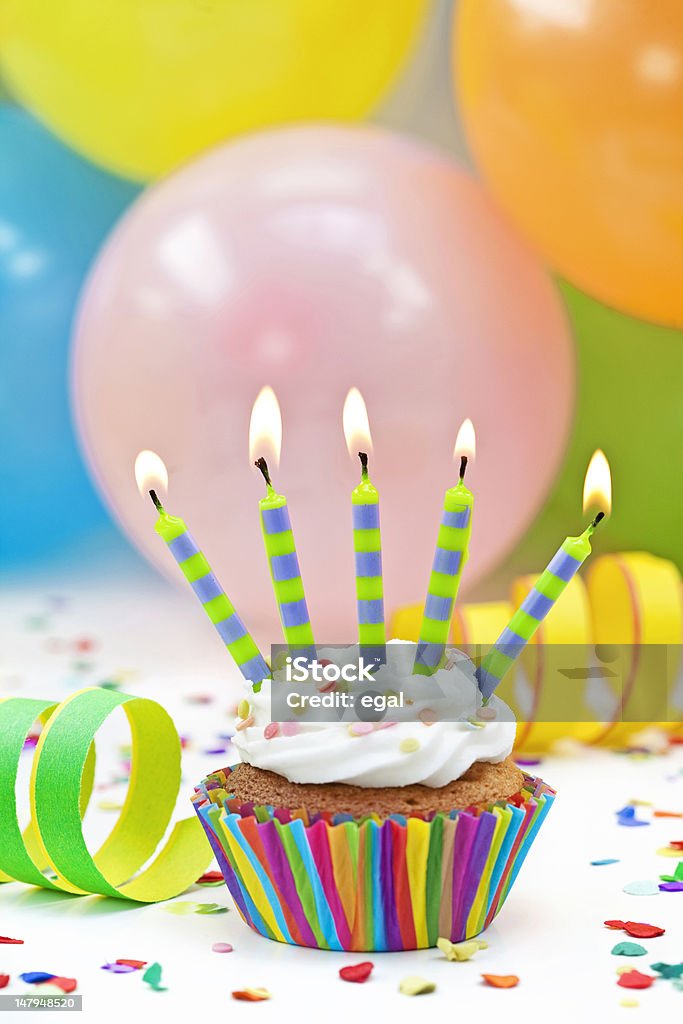 Colorful birthday candles Colorful birthday candles and balloons Anniversary Stock Photo