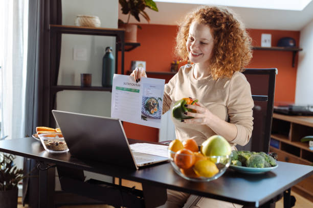 istock Woman making a nutrition plan for the client 1479492741