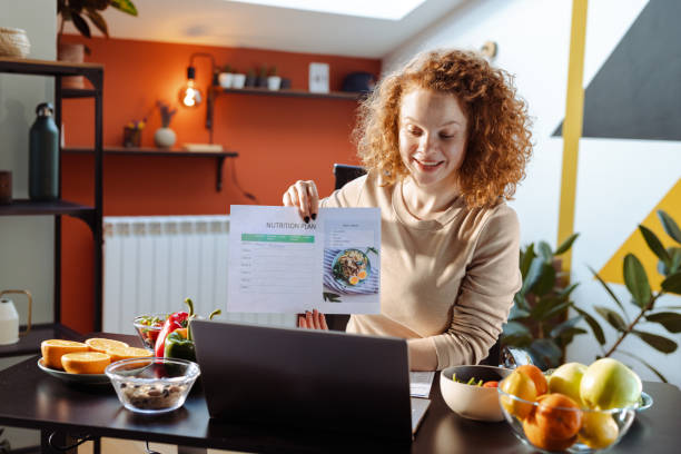 istock Woman making a nutrition plan for the client 1479492744