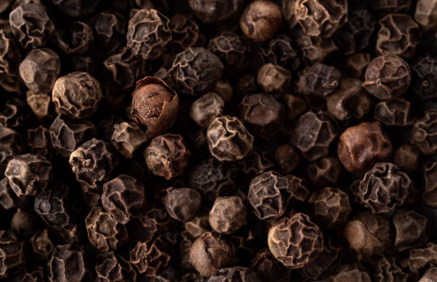 istock Black pepper bed covered in full screen macro. Close up 1479493403
