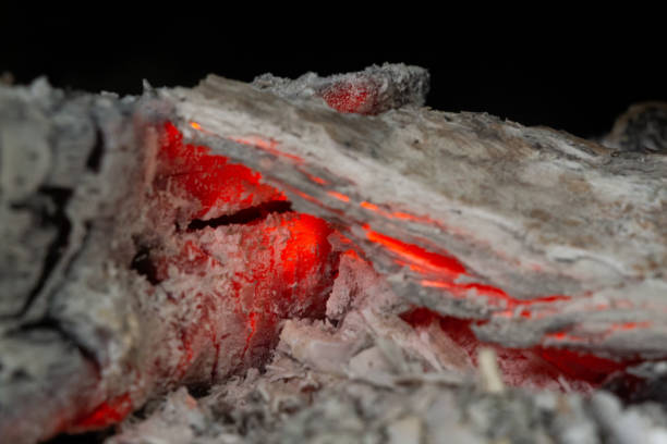 istock Pieces of firewood and burning coal 1479495375