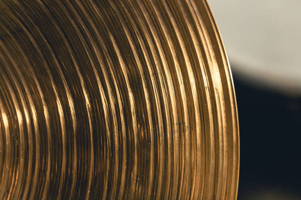 istock Drum cymbal close-up on a dark background, top view. 1479501288
