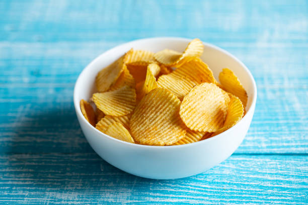 istock Close-up, a plate of potato chips on a blurred background. 1479503398