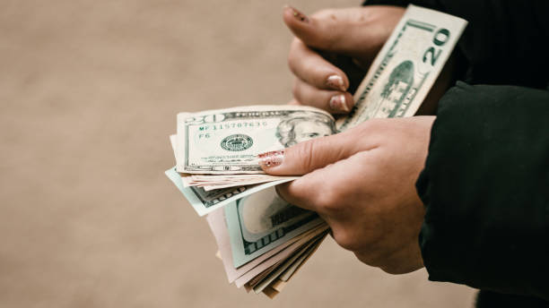 istock US dollar currency. USD inflation, US money 1479503413