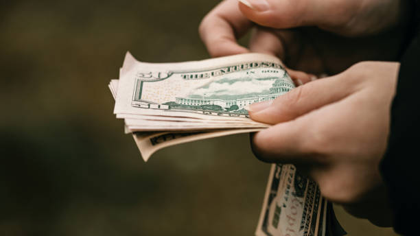 istock US dollar currency. USD inflation, US money 1479503467