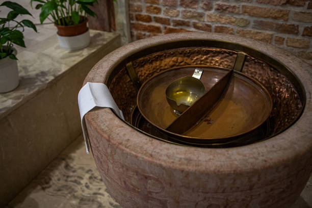 Holy water inside a church ready for a baptism, catholic celebration.