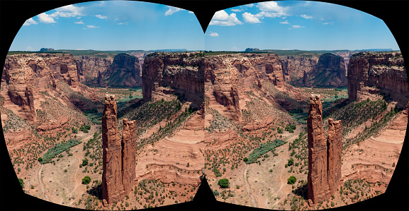 Looking into the canyon in the Colorado plateau with sky and clouds.