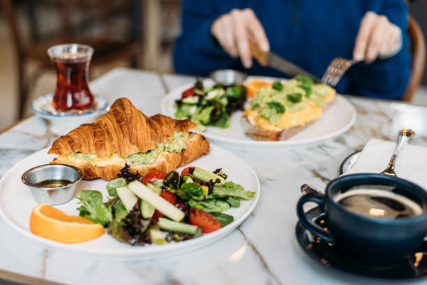 istock A croissant sandwich and tartine on table for breakfast 1479509970