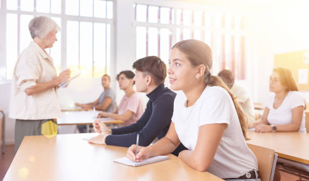 istock Girl attending lecture in college 1479511124