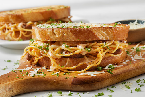 Spaghetti Grilled Cheese Sandwich on Garlic French Bread with Meat Sauce, Mozzarella and Fresh Parmesan