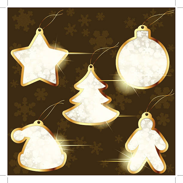 Collection of golden winter labels Collection of gold and beige wintry design elements. Includes AI CS3 file. silhouette of christmas cookie border stock illustrations