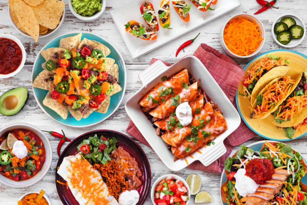 istock Mexican food table scene. Overhead view on a white wood background. 1479525648