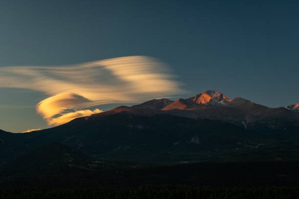 Clouds Above Longs Peak at Sunrise stock photo