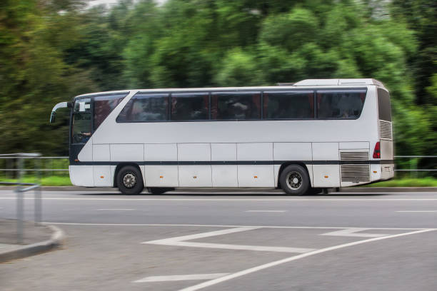 istock bus moves down the street 1479533778
