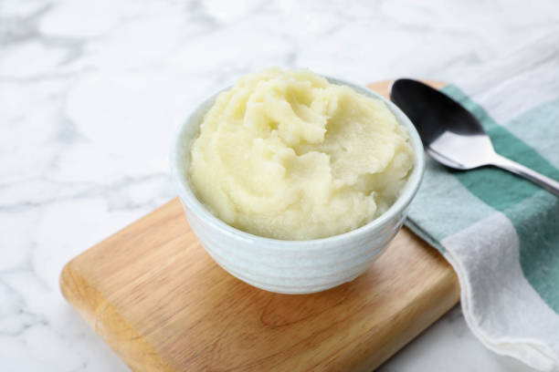 istock Bowl with tasty puree food served on white marble table 1479534559