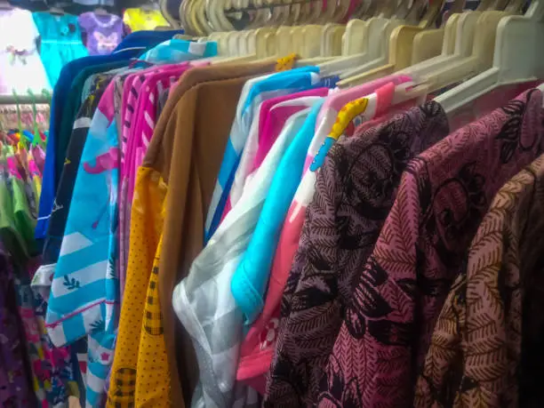 Photo of line of women's clothing sold in the market