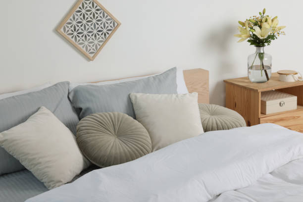 istock Beautiful bedroom interior with fresh flowers and decor 1479537599