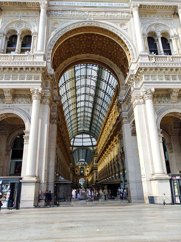 The entrance gate to the Galleria Vittorio Emanuele II in the Piazza del Duomo (cathedral square) located in the city center of Milan