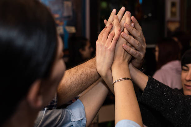 istock People holding hands all together 1479542722