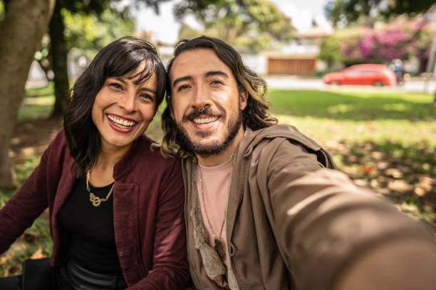 istock Friends taking a selfie outdoors - camera point of view 1479548554