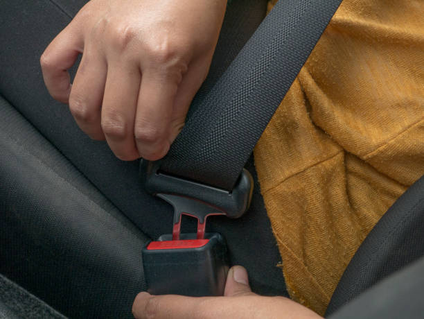 istock Woman Driver Put on Seat Belt 1479551116