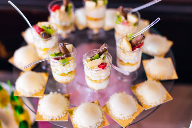 istock delicious desserts in a cup and cookies. wedding reception. 1479554595