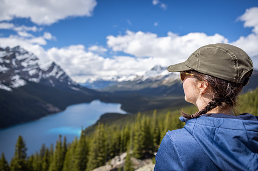 Young Woman Looking at the View of Peyto Lake in Banff National Park, Alberta, Canada