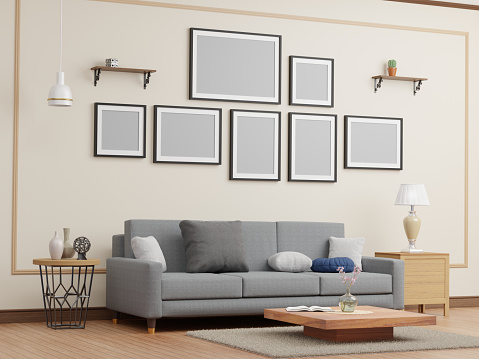 Seven dark multi-layout picture, photo frames mockup on wall on top of sofa and stand with vases, lamp, cushions and decor
