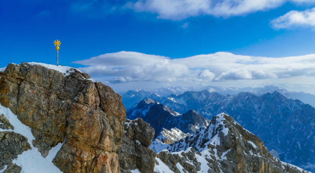 istock Rock of Mountain Zugspitze with Summit Cross 1479568328