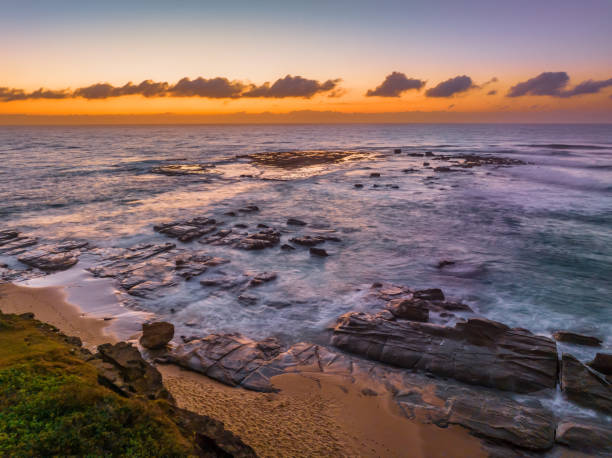 istock Aerial sunrise seascape with  high tide and rock platform 1479571532