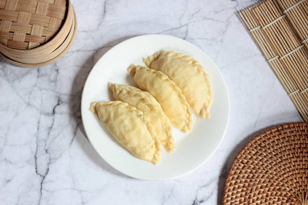 istock ready-to-cook raw kue pastel filled with vegetables and chicken 1479572544