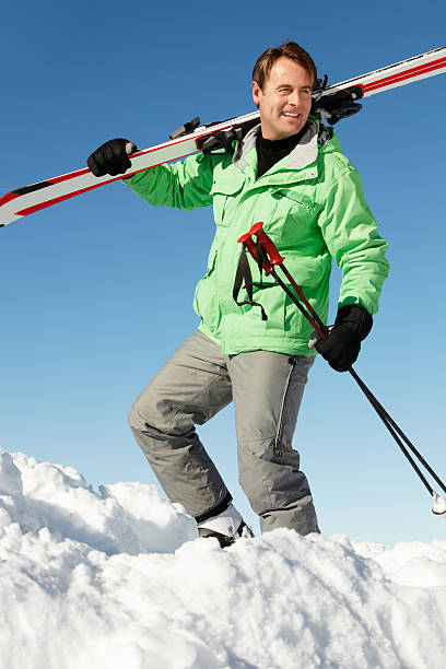 istock Middle Aged Man On Ski Holiday In Mountains 147957932