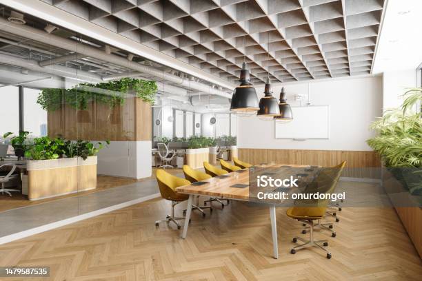 Ecofriendly Open Plan Modern Office Interior With Meeting Room Wooden Meeting Table Yellow Chairs Plants And Parquet Floor Stock Photo - Download Image Now