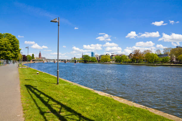 istock Frankfurt panoramic view across River Main bridge to skyscrapers Germany. 1479587573