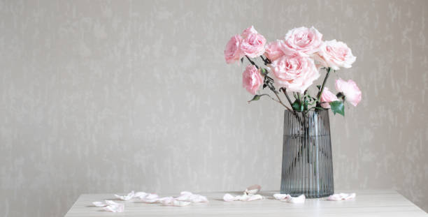 istock still life with pink roses in glass vase 1479594030