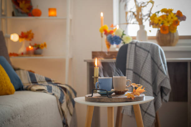 istock two  cups with hot drinks at home with autumnal decor 1479594038