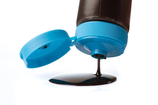 istock Chocolate uses a chocolate squeeze bottle on white background 1479595937