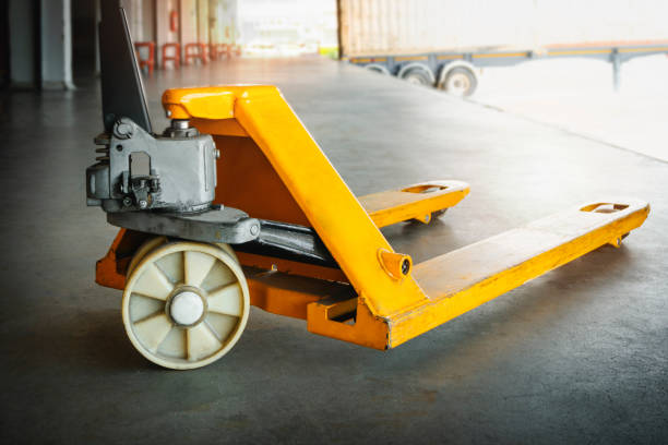 Hand Pallet Truck or Manaul Hand Lift. Pallet Jack Loader. Hand Pallet Truck or Manaul Hand Lift. Pallet Jack Loader. pallet jack handle stock pictures, royalty-free photos & images