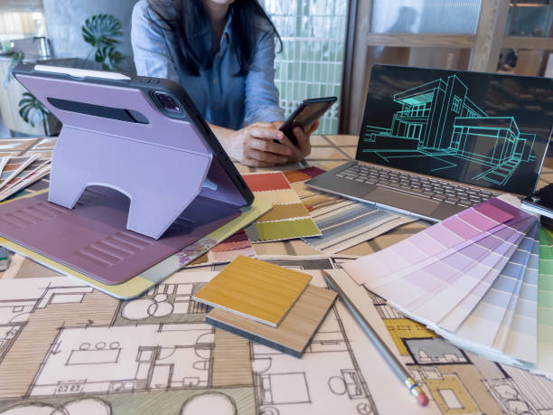 istock Female designer working with smart device in modern office. 1479615152