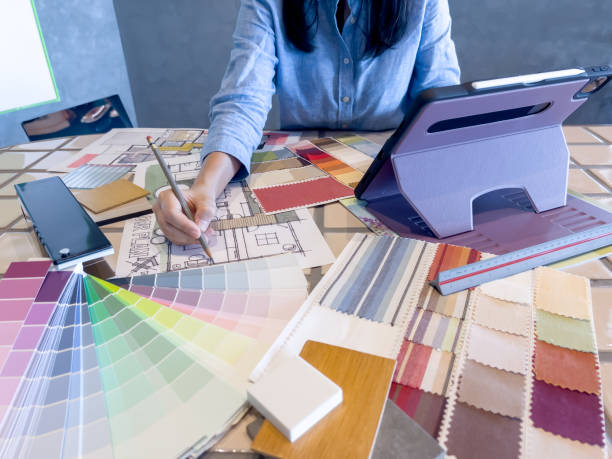 istock Female designer working with smart device in modern office. 1479615153
