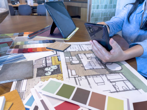 istock Female designer working with smart device in modern office. 1479615207