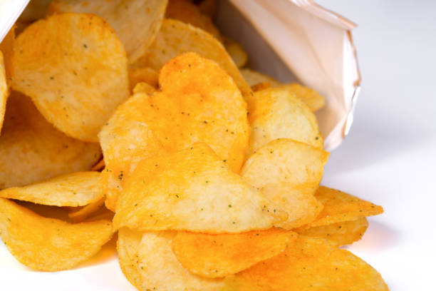 istock Potato chips fell out of a package. 1479618662