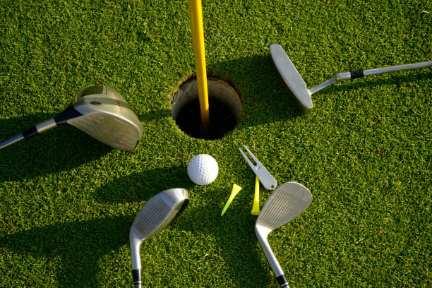 istock Golf equipment on green grass 1479621181