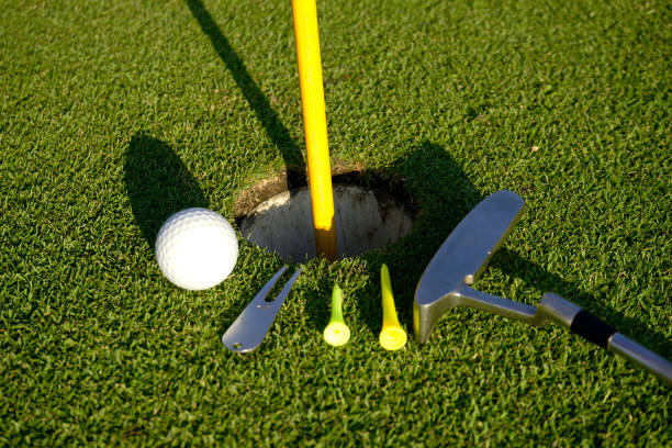 istock Golf equipment on green grass 1479621279