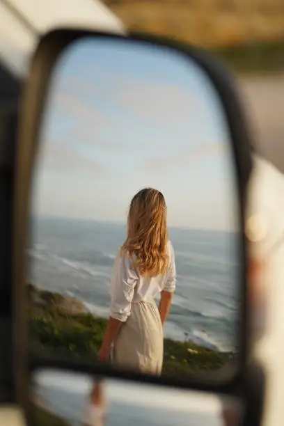 She is looking out to sea